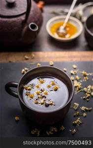 Cup of healthy herbal chamomile tea