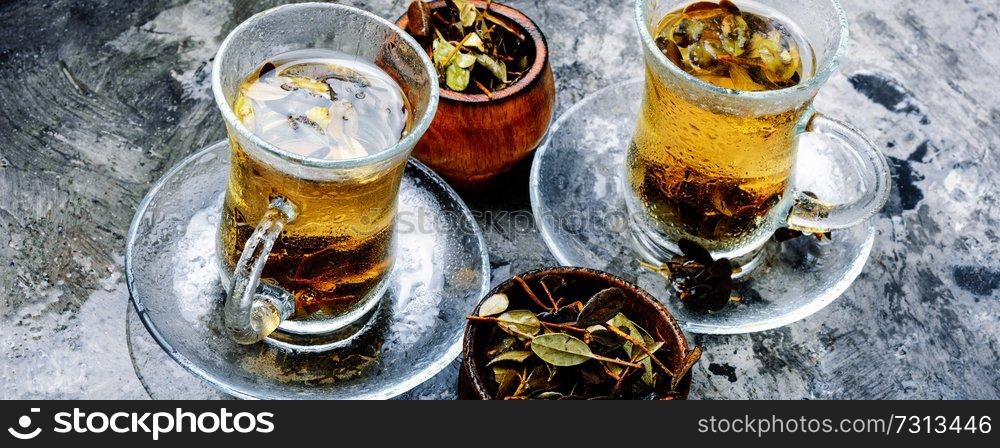Cup of healthy herbal tea.Cowberry leaf tea. Cup of herbal tea
