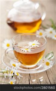 cup of herbal tea with chamomile flowers
