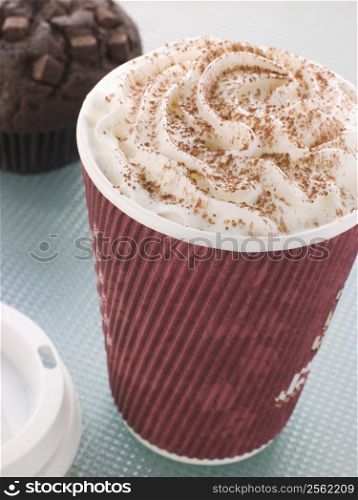 Cup Of Hot Chocolate With A Double Chocolate Muffin