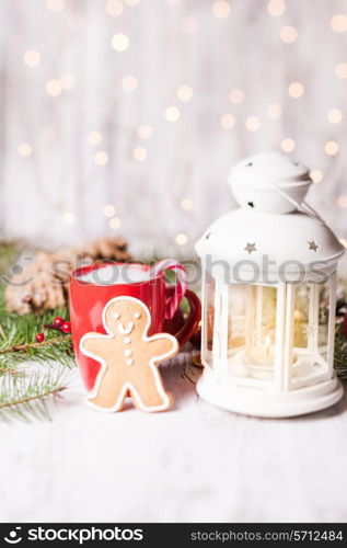 Cup of hot cocoa drink with cookie and candy. Christmas dessert