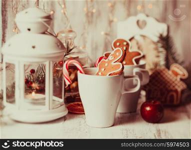 Cup of hot cocoa drink with cookie and candy. Christmas dessert. The Christmas dessert