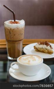 Cup of hot Coffee and ice coffee with Banoffee pie. coffee and pie
