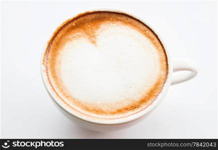 Cup of hot coffee latte with microfoam on top