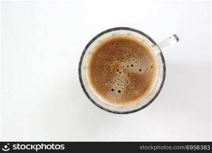 cup of hot coffee on white table. cup of hot coffee