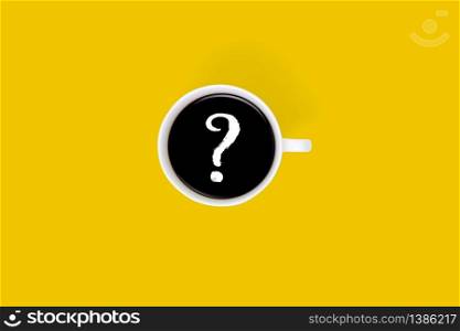 Cup of hot coffee with question mark isolated on yellow background, top view, q & a, faq or assistance for incentive, advice information, beverage or breakfast, communication and idea concept.