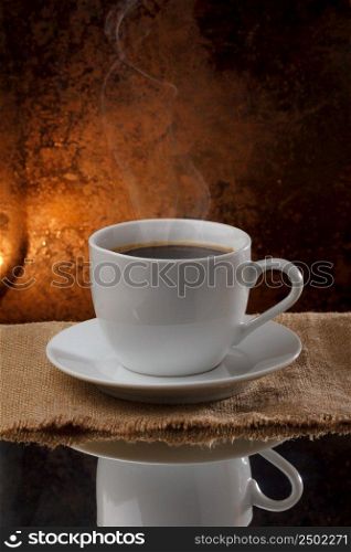 Cup of hot coffee with steam