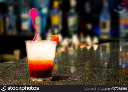 cup of Iced Cocktail with bar background