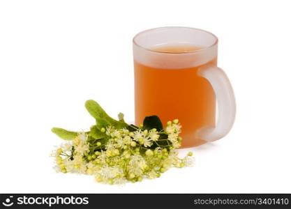 Cup of linden tea and linden blossom