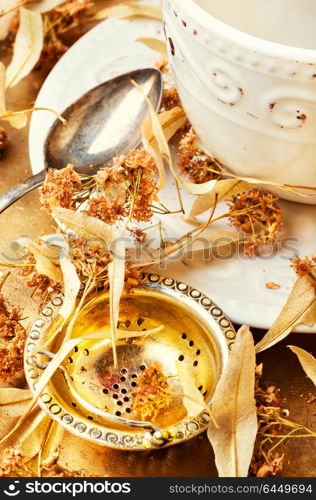 Cup of linden tea. Mug of herbal tea with linden flowers.Healing tea.Herbs tea