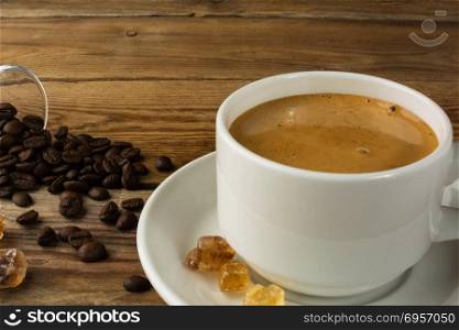 Cup of strong morning coffee and brown sugar. Cup of coffee. Morning coffee. Coffee break. Strong coffee. Cup of strong morning coffee and brown sugar