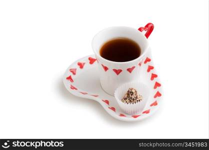 cup of tea and candy isolated on a white background