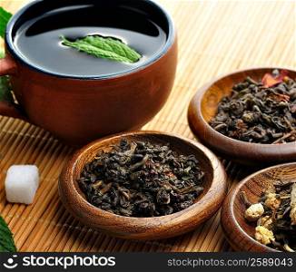 Cup Of Tea And Loose Tea Assortment