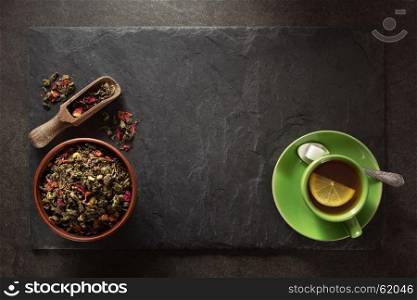 cup of tea and slate background