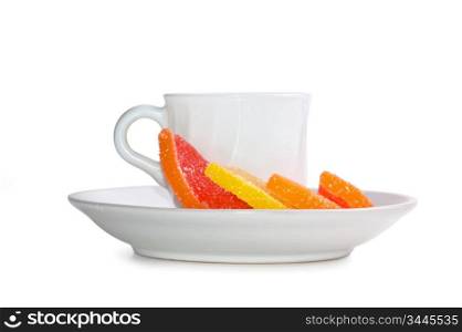cup of tea and slices of fruits isolated on a white background