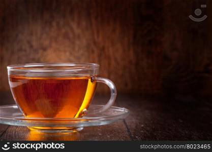 Cup of tea. Cup of tea on a wooden background