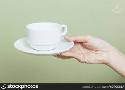 cup of tea or coffee in hand