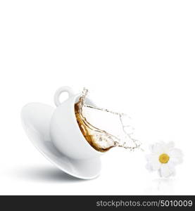 Cup of tea. White cup of chamomile tea against white background