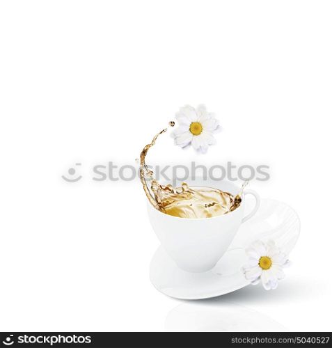 Cup of tea. White cup of chamomile tea against white background