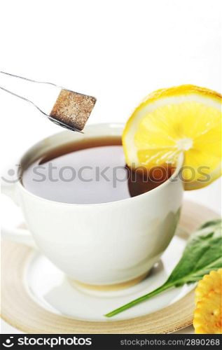 cup of tea with lemon and sugar