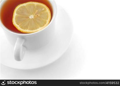 Cup of tea with lemon, isolated with clipping path