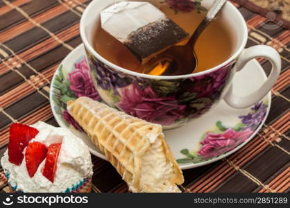 cup of tea with pastry after dinner
