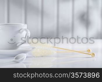 cup spoon and sugar stick