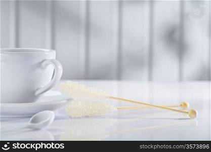 cup spoon and sugar stick