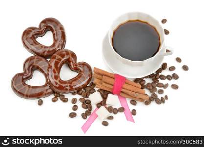Cup with coffee, beans coffee and biscuits in the form of hearts isolated on white background.