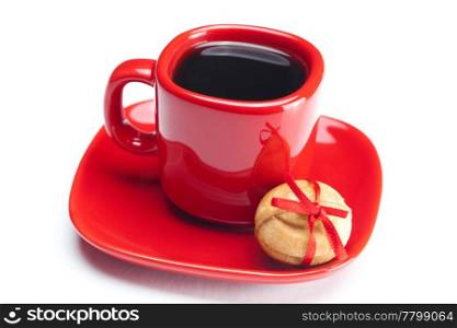 cup with coffee ,cake nut and ribbon isolated on white