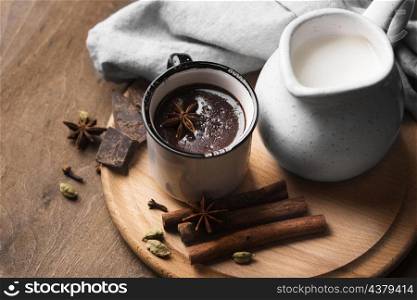 cup with hot chocolate aromatic drink table