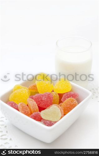 cup with many gummy colorful candies