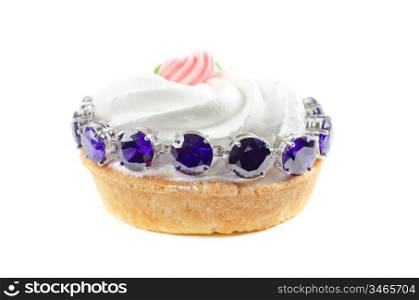 cupcake and bijouterie bracelet on a white background