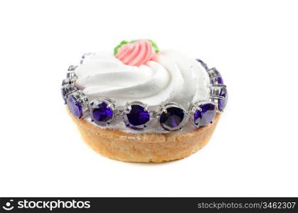 cupcake and bijouterie bracelet with blue gems on a white background