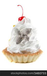cupcake and bijouterie flower on a white background