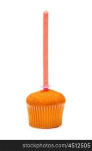 Cupcake and candle isolated on the white background