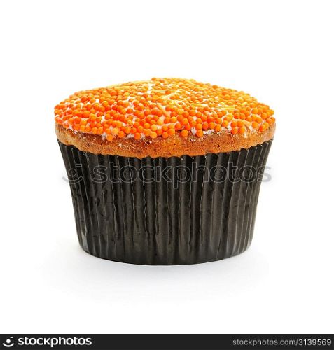 Cupcake with orange icing isolated on white