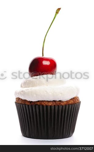 Cupcake with whipped cream and cherry isolated on white