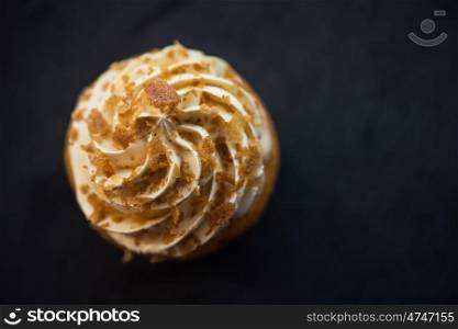 Cupcakes desert cream. Cupcakes desert cream with space for text on a stone background