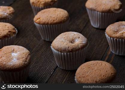Cupcakes on wooden table still life