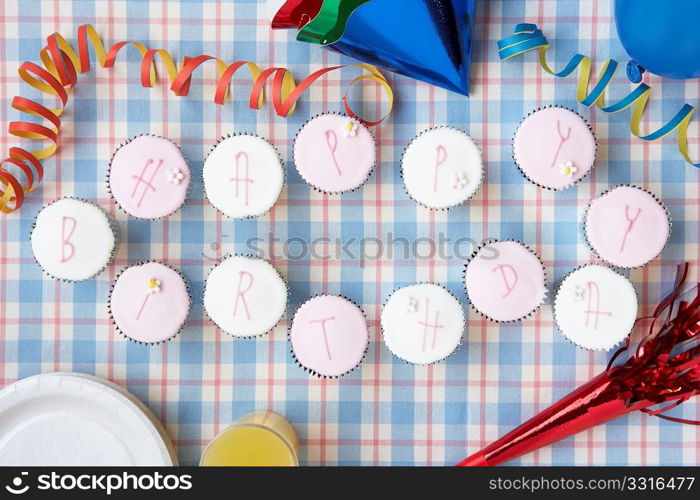 Cupcakes spell out happy birthday