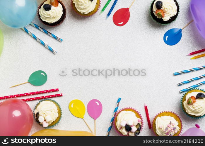 cupcakes with air balloons candles table