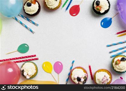 cupcakes with air balloons candles table
