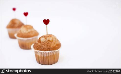 cupcakes with small heart toppers
