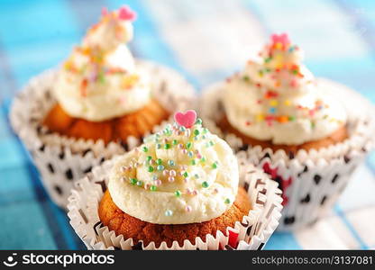 Cupcakes with whipped cream and icing