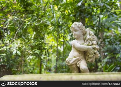 Cupid sculpture in the garden
