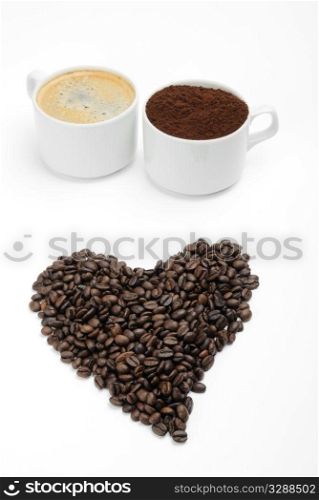 cups with coffee,beans and blend. closeup