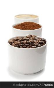 cups with coffee beans, blend and espresso. closeup