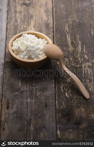 curds in a wooden bowl