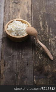 curds in a wooden bowl